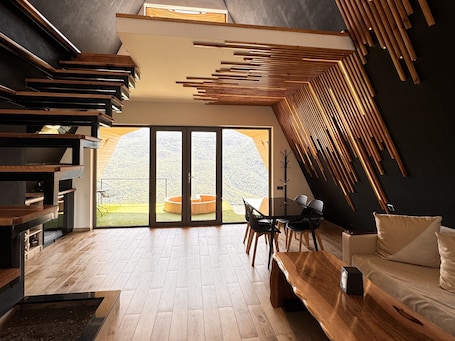 Deluxe Cottage, Balcony, Mountain View | Living area. Lost in Sky