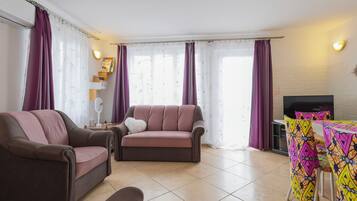 TV, DVD player, foosball