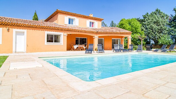 A two-story house with a swimming pool, outdoor seating, and a garden. - Villa Faro by Interhome (Montfort)