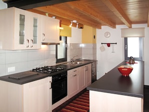 Fridge, oven, cookware/dishes/utensils