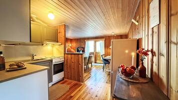 Fridge, oven, highchair, cookware/dishes/utensils