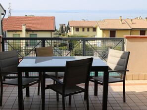 Outdoor dining - Garden Village by Interhome (Lazise)