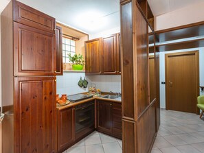 Fridge, oven, high chair, cookware/dishes/utensils