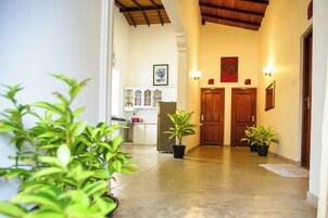 Double Room, Pool View | Living area