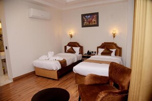 Deluxe Double Room, City View | Desk, soundproofing, free WiFi, bed sheets - The Rich Hotel & Apartments (Lahore)