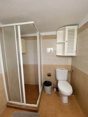 Shower, towels, soap, shampoo