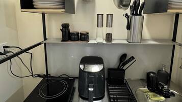 Microwave, stovetop, coffee/tea maker, toaster