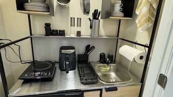 Fridge, microwave, stovetop, coffee/tea maker