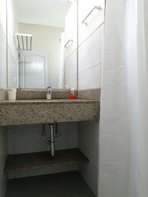 Shower, towels, soap, shampoo