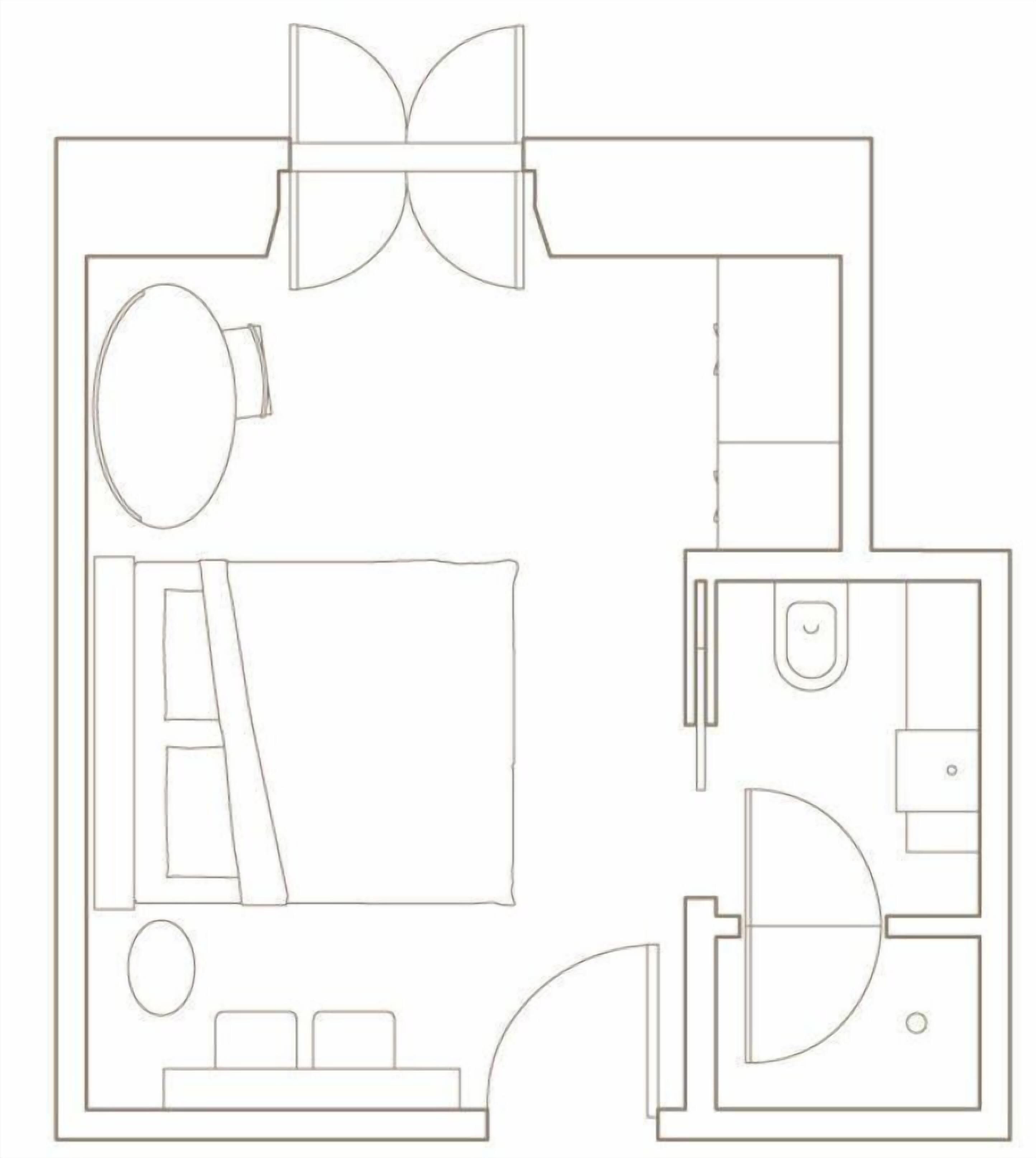 A floor plan with a large bedroom, a bathroom, a kitchen, and a dining area.