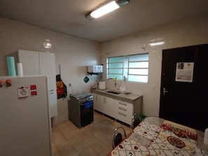 Fridge, microwave, stovetop, cookware/dishes/utensils