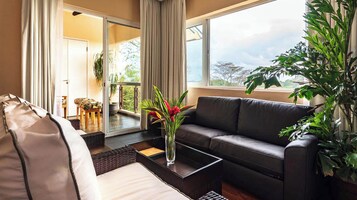 Suite | Living area | 55-inch LCD TV with cable channels, DVD player, MP3 dock