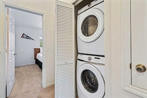 Enjoy the convenience of a washer and dryer, making laundry a breeze - Space-saving stackable design fits neatly in the closet, providing full laundry capabilities - Keep your wardrobe fresh and clean effortlessly, enhancing your convenience