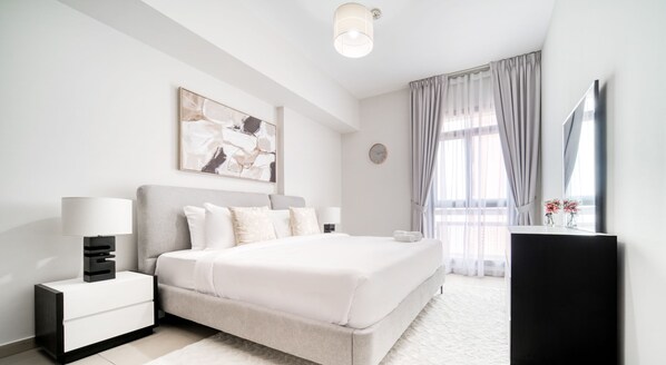 Family Apartment, City View | 1 bedroom, in-room safe, blackout curtains, iron/ironing board