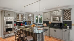 House, 4 Bedrooms | Private kitchen | Fridge, oven, coffee/tea maker, electric kettle