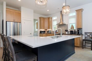 Fridge, microwave, oven, stovetop - TresSea: Fabulous 6 bedroom new construction home! (Kure Beach)