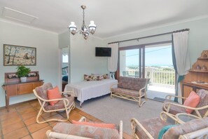 Lägenhet Deluxe | Vardagsrum | Eldstad