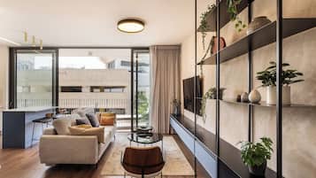 Apartamento | Área de estar | TV