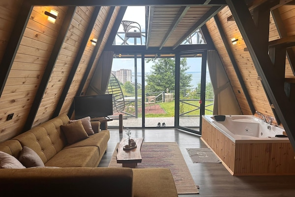 Bungalow Deluxe, vue mer | Coin séjour