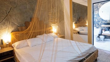 Suite Deluxe, 1 cama King size, baño privado | Minibar, escritorio, cortinas blackout y wifi gratis