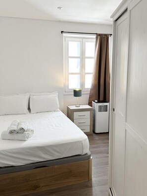 2 slaapkamers, een strijkplank/strijkijzer, reisbedje, gratis wifi