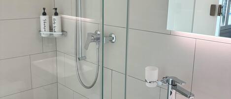 Hair dryer, towels, soap, toilet paper