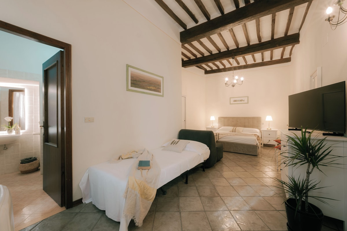 Family Triple Room | Minibar, free WiFi, bed sheets