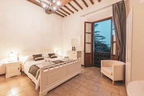 Quarto standard, vista para o jardim | Frigobar, Wi-Fi de cortesia, roupa de cama