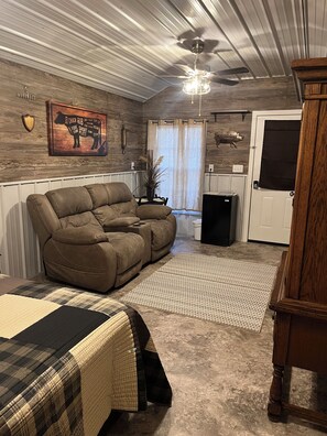 Living area - “Delbert” one of the 5 Tiny Cabins on the Osage River (Tuscumbia)