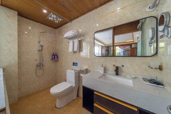 A bathroom with a toilet, sink, mirror, shower, and towel rack. - Home Inn (Zhongyi) (Lijiang)