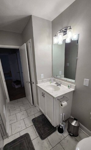 Hair dryer, towels, soap, toilet paper