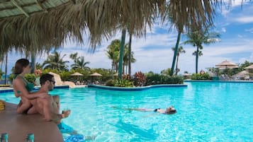 12 outdoor pools, open 7:00 AM to 7:00 PM, lifeguards on site
