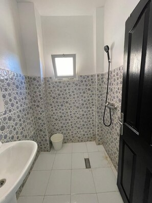 Shower, towels, soap, shampoo