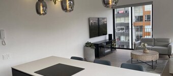 Charming 3-bedroom condo with undisturbed views of Caroline Park. 