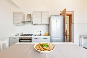Fridge, stovetop, cookware/dishes/utensils