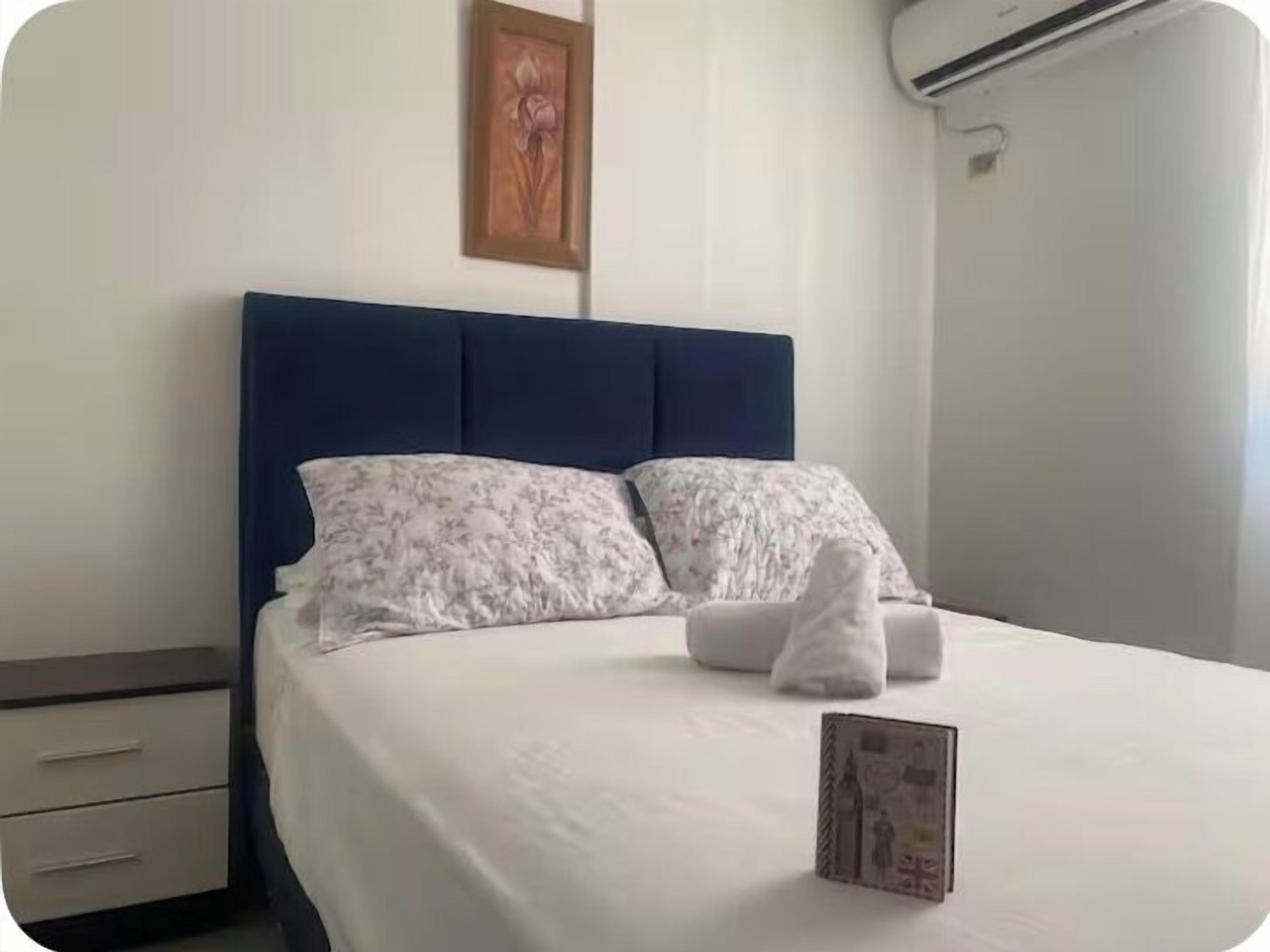 2 dormitorios, tabla de planchar con plancha, wifi gratis y ropa de cama
