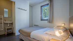 2 bedrooms, WiFi, bed sheets - Appart au pied des Grands Vans avec jacuzzi commun (FLAINE)
