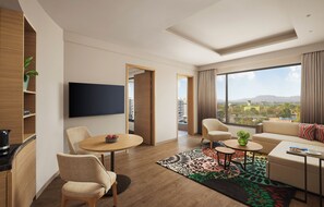 Executive Suite, 1 Bedroom, Balcony | Living area | 55-inch Smart TV with satellite channels, Netflix, streaming services - Hyatt Place Aurangabad Airport (Chhatrapati Sambhajinagar)