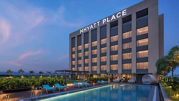 Outdoor pool, open 7:00 AM to 8:00 PM, sun loungers, lifeguards on site