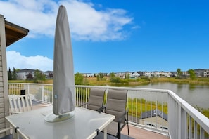 Patio furniture on the deck to enjoy a BBQ or meals outside.  - 48A Luxury Lake Home w/ Massage Meditation Gym A/C (Calgary)