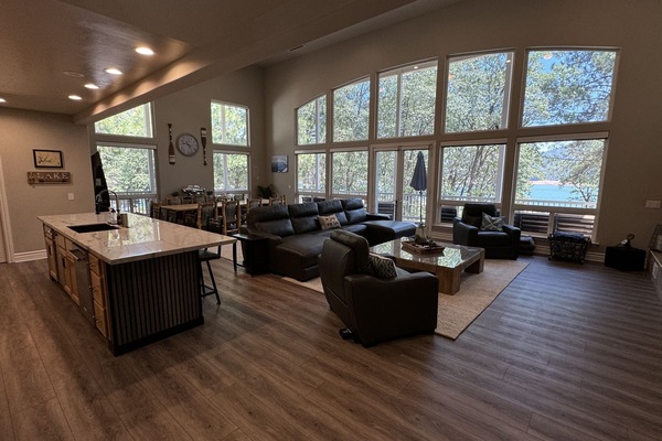 Kitchen looking out at family room and lake