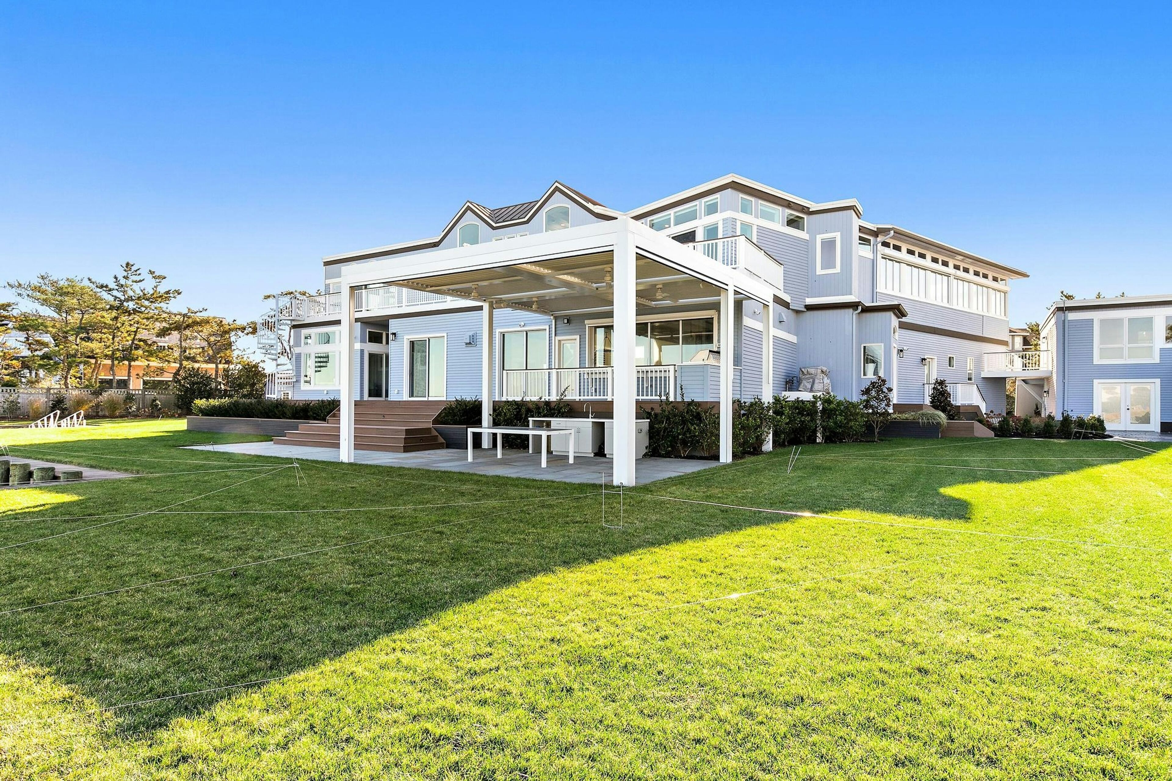 Luxurious Beach Haven Estate with Bayfront Pool, Hot Tub, and Stunning Views