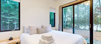 Idyllic lakeside house with outdoor sauna, patio and firepit