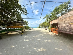 Private beach, white sand, sun-loungers, beach umbrellas