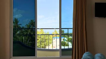 Family Room, 2 Bedrooms, Balcony, Sea View | Minibar, in-room safe, desk, laptop workspace