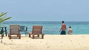 Private beach, white sand, sun-loungers, beach umbrellas