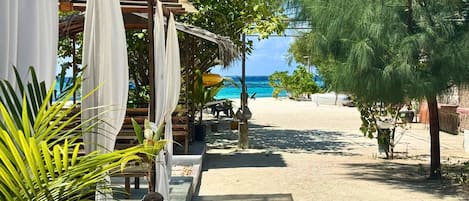 Private beach, white sand, sun-loungers, beach umbrellas
