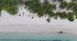 Private beach, white sand, sun loungers, beach umbrellas