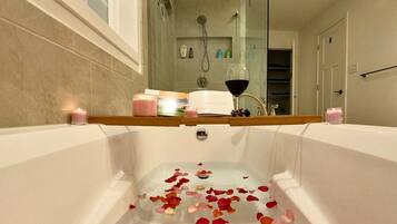 Shower, eco-friendly toiletries, hair dryer, towels