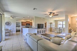Smart TV, books - Family Retreat: Four Bedroom in Cape Coral with Heated Pool and Modern Amenities (Cape Coral)